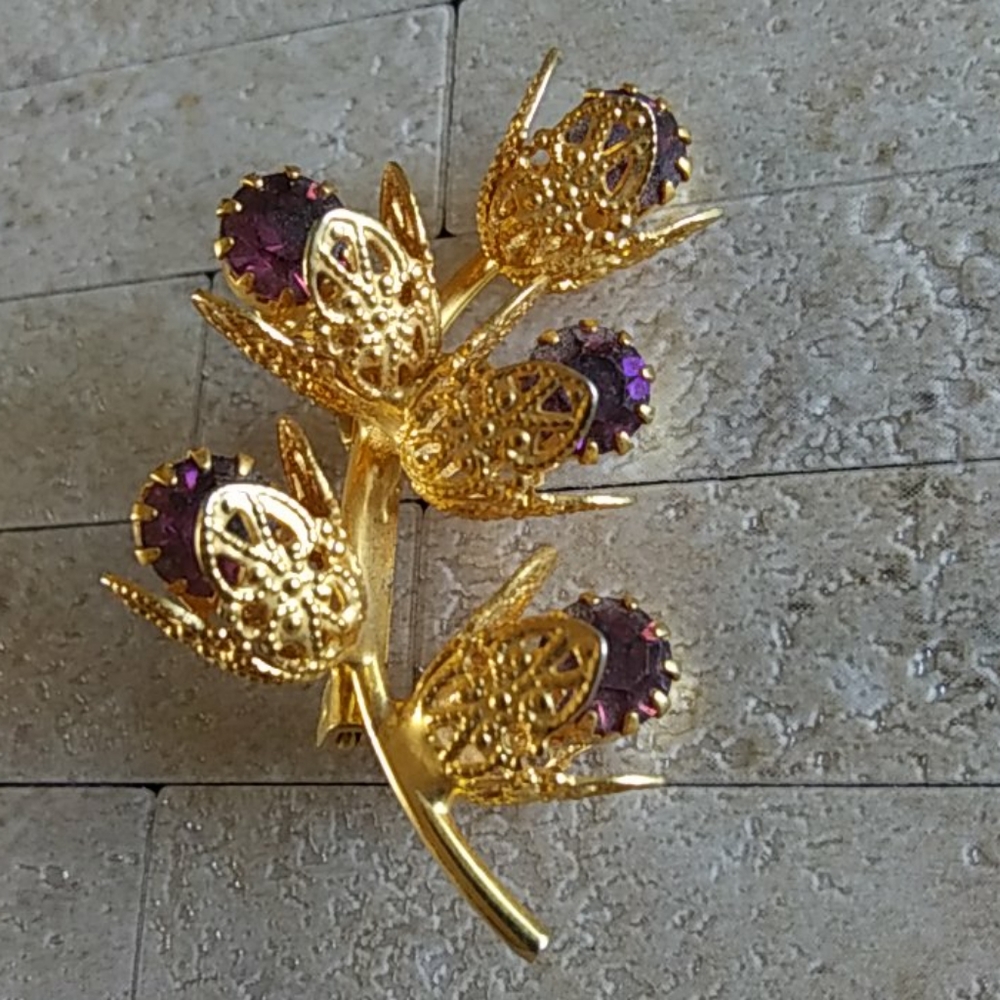 Golden Brooch with Faceted Dark Purple Stones 1.5" Long Floral Theme